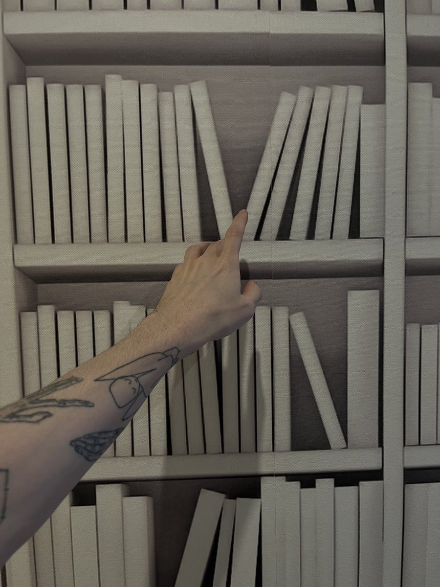 chriserikthomas's tweet image. In Bilbao for a final assignment for the year and was not ideologically prepared for the aesthetic bookcase wallpaper
