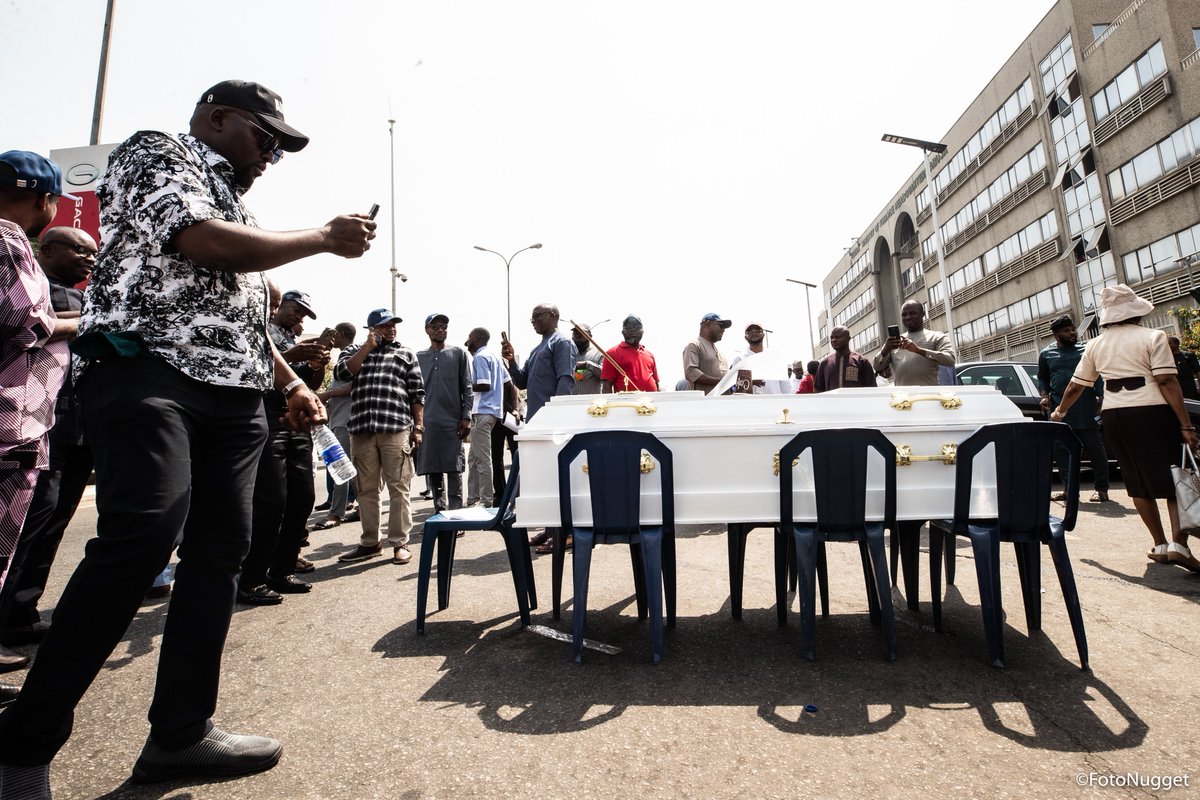 FotoNugget's tweet photo. PHOTO NEWS: Contractors Storm Finance Ministry Headquarters in Abuja, Hold Symbolic ‘Burial’ for Minister Over Unpaid Debts.

Abuja, Nigeria
03-12-2025 https://t.co/uPnb55zmTX