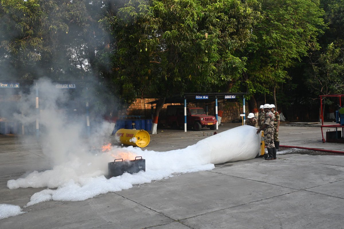CISFSouth's tweet photo. CISF Fire Wing is working relentlessly to control the blaze and ensure everyone’s safety. Their dedication and swift action continues to save lives and property. #CISF #FireWing #AlwaysAlert @CISFHQrs https://t.co/K8Bv39c4NB
