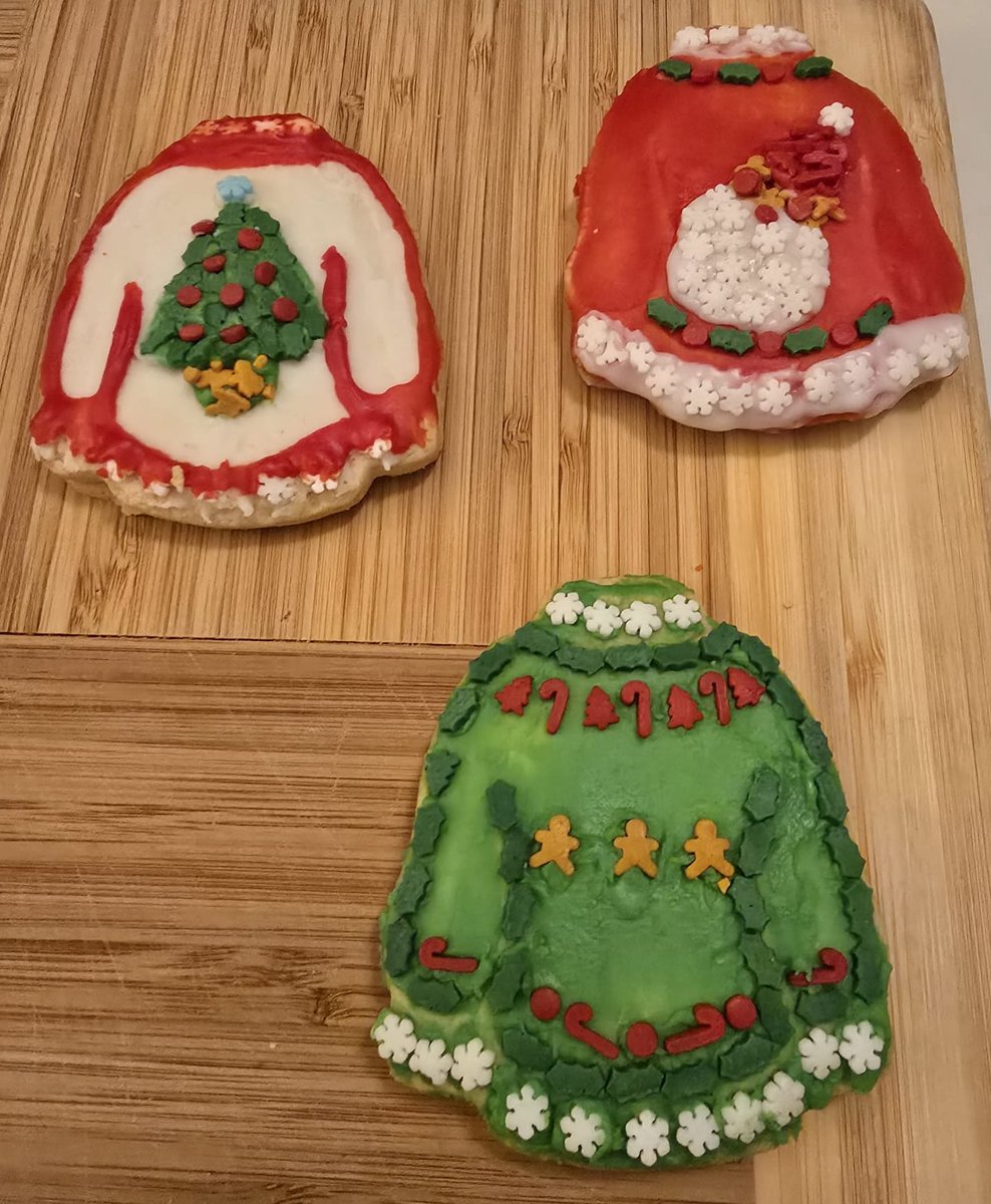 PostalAdvocate's tweet image. Today is #NationalCookieDay. Earlier this week our team got together and did some virtual team bonding where we all decorated some chocolate cookie sweaters. Such a fun time! Check out some of our creative designs. #Cookies #Holidays