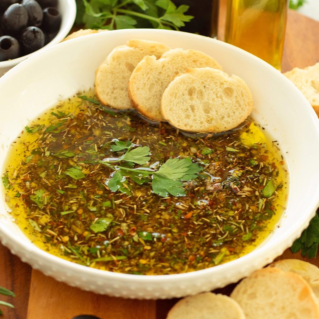 Serve this Olive Oil Bread Dip with warm, crusty bread for a restaurant-style appetizer you can enjoy at home anytime. #oliveoilbreaddip #breaddip #oliveoil #appetizer melissassouthernstylekitchen.com/olive-oil-brea…
