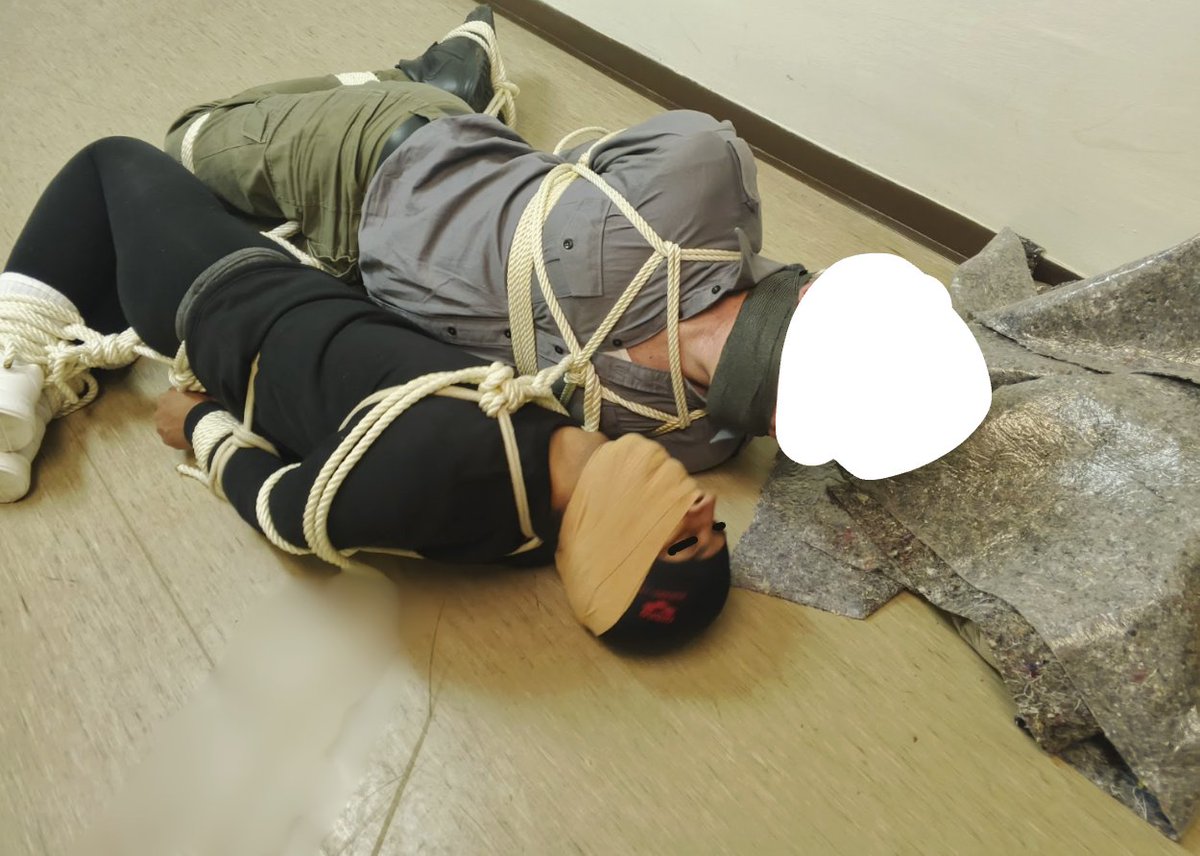 sharing a hogtie with a dear friend while being crotch roped