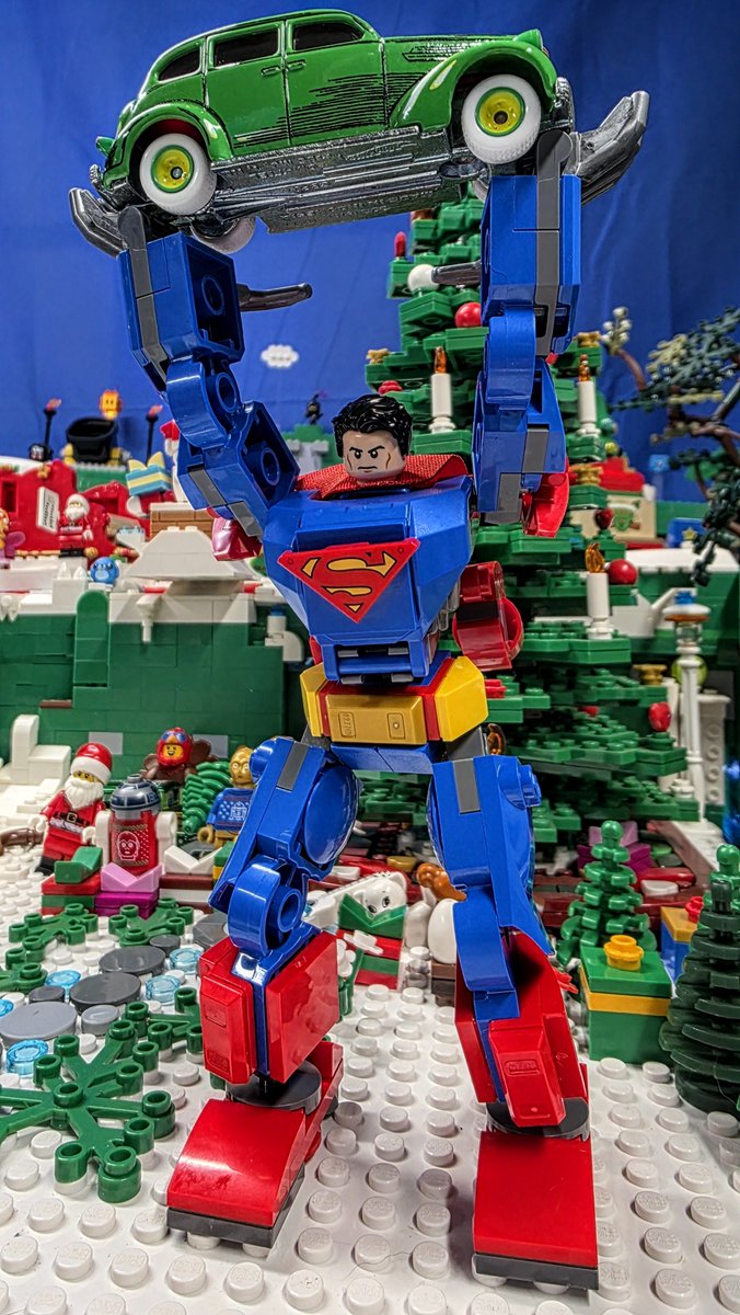 LEGO Superman Mech holding the Hot Wheels Pop Culture Action Comics #1 Action Sedan