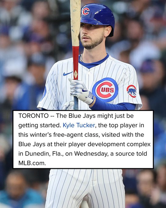 A screenshot of a MLB.com article reads:
"TORONTO -- The Blue Jays might just be getting started. Kyle Tucker, the top player in this winter's free-agent class, visited with the Blue Jays at their player development complex in Dunedin, Fla., on Wednesday, a source told MLB.com."
Pictured: Kyle Tucker wears a white Chicago Cubs uniform and holds his bat.