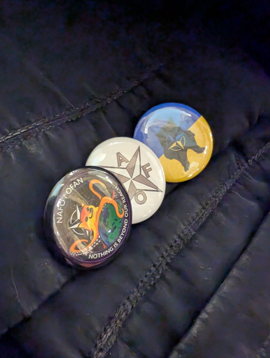 On a recent business trip, these Nafo buttons were recognized and appreciated at the weekend farm market: