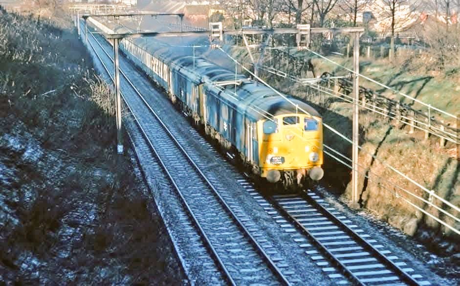 On this day. 
Railtours over the Woodhead Route where exceptionally popular.

Here we see 24082 &amp; 24087 with the Great Central railtour at Torside level crossing and Oxspring respectively on a bitterly cold 4th December 1976.

©Paul Braybrook