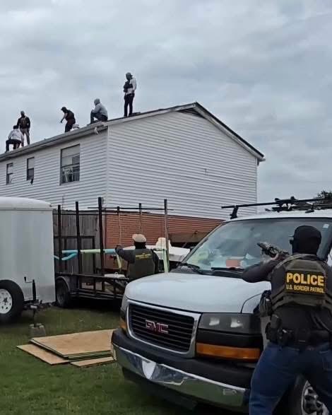 Timodc's tweet image. Masked fucks pointing weapons at roofers outside New Orleans. No probable cause just targeting Hispanics working construction.