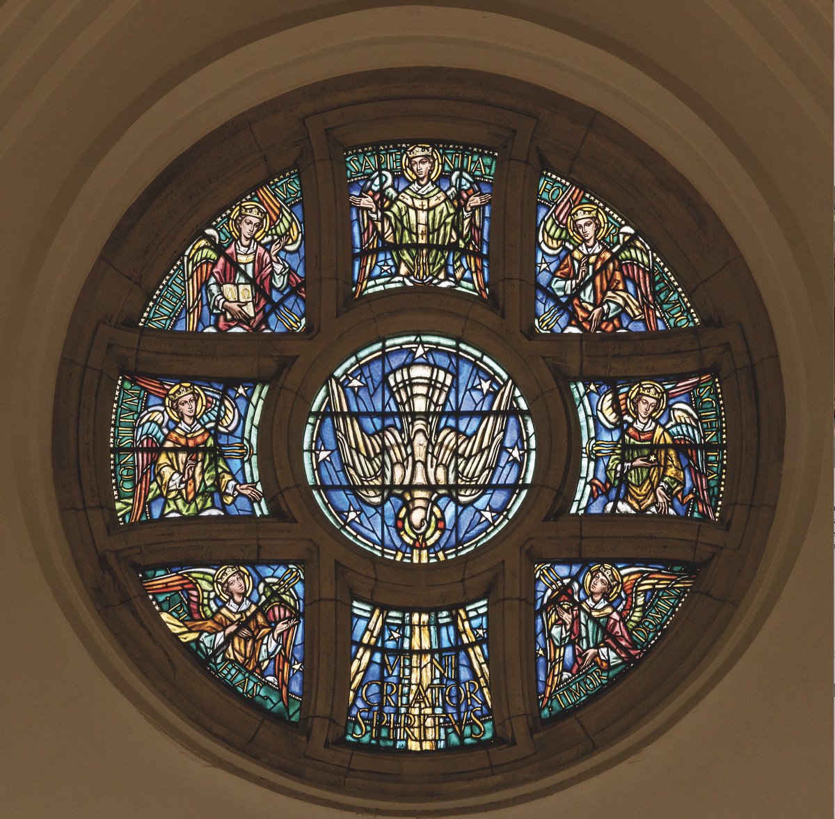 "the window was made under extreme difficulties"

We're at <a href="/GuildCath/">Guildford Cathedral</a> for #DivineLight and East, Rose Window (commissioned 1939 – dedicated 1952).

The eyes of visitors arriving at the West Door of Guildford Cathedral are immediately drawn to the striking East, Rose Window.
