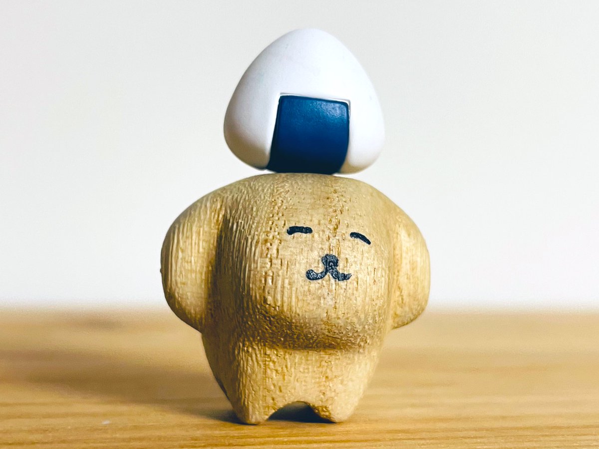 おにぎりゲットしたほほえみ犬