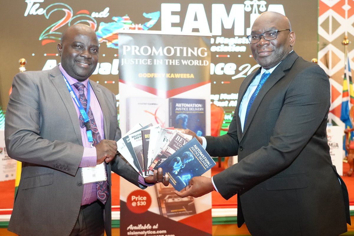 KJA Deputy Director, Duncan Okello, receiving book donations for the Academy from the Deputy Registrar, Lira High Court Circuit, His Worship Godfrey Kaweesa at the ongoing EMJA Conference <a href="/JudiciaryUG/">Judiciary Uganda</a> <a href="/jsckenya/">Judicial Service Commission Kenya (JSC)</a> <a href="/Kenyajudiciary/">The Judiciary Kenya</a>