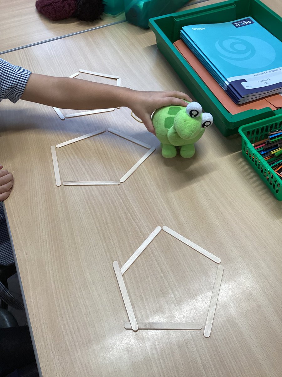 IntakeSchool's tweet photo. Y2 Shape Investigation - Can you make 3 2D shapes using 15 lollipop sticks? Can you make 3 of the same shape using ALL 15 lollipop sticks? Of course, Y2T smashed this challenge!!!! 🐢 #mathsatintake @WhiteRoseMaths https://t.co/8evOtE2MSc
