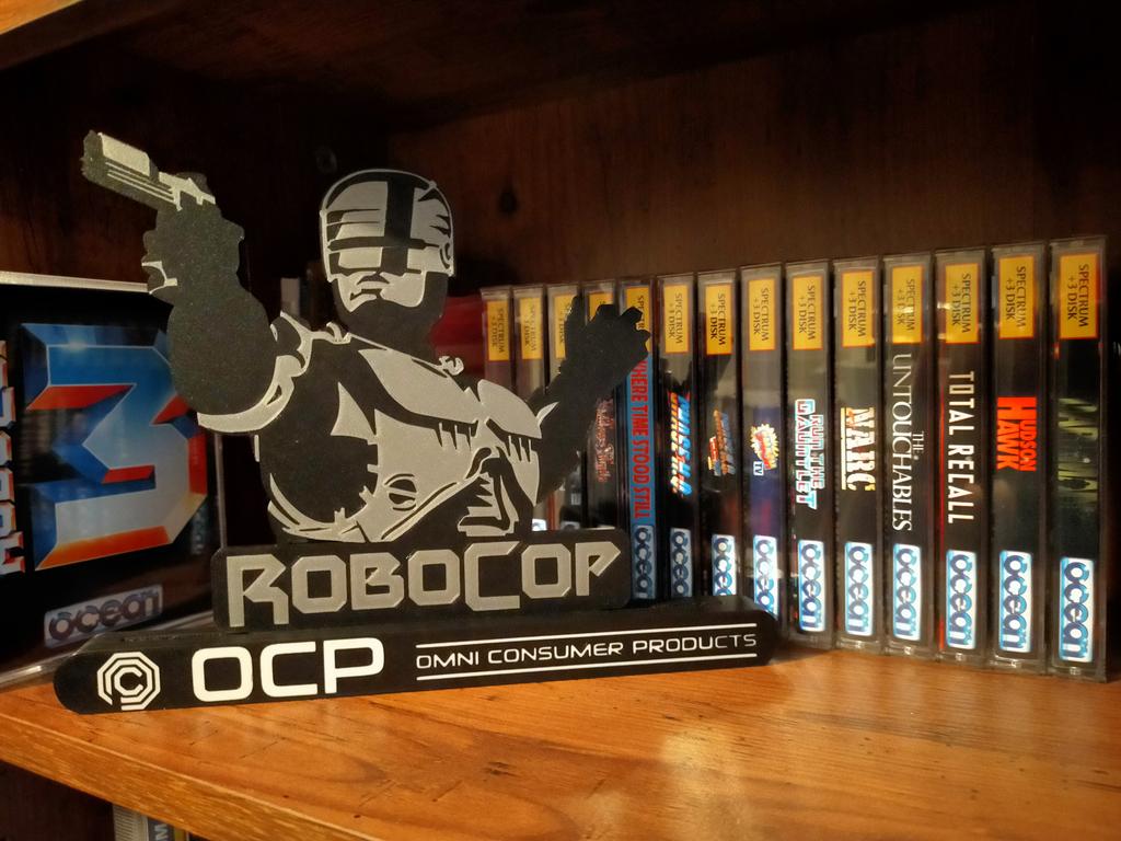 Robocop 3D Printed Shelf Display to compliment disk editions of the trilogy on the #Sinclair #Spectrum +3. Redrawn high resolution artwork &amp; disk labels needed to be protected on the shelf alongside other Ocean titles #robocop #shareyourgames #retrogames