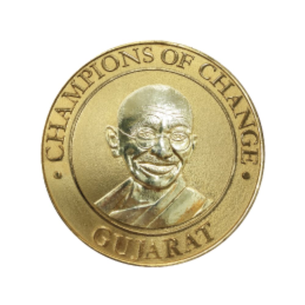 A distinguished Champions of Change – Gujarat medal, featuring an intricately crafted portrait inspired by the timeless ideals of Mahatma Gandhi — truth, non-violence, and transformative leadership — symbolizing valour, resilience, and enduring moral strength

#ChampionsOfChange
