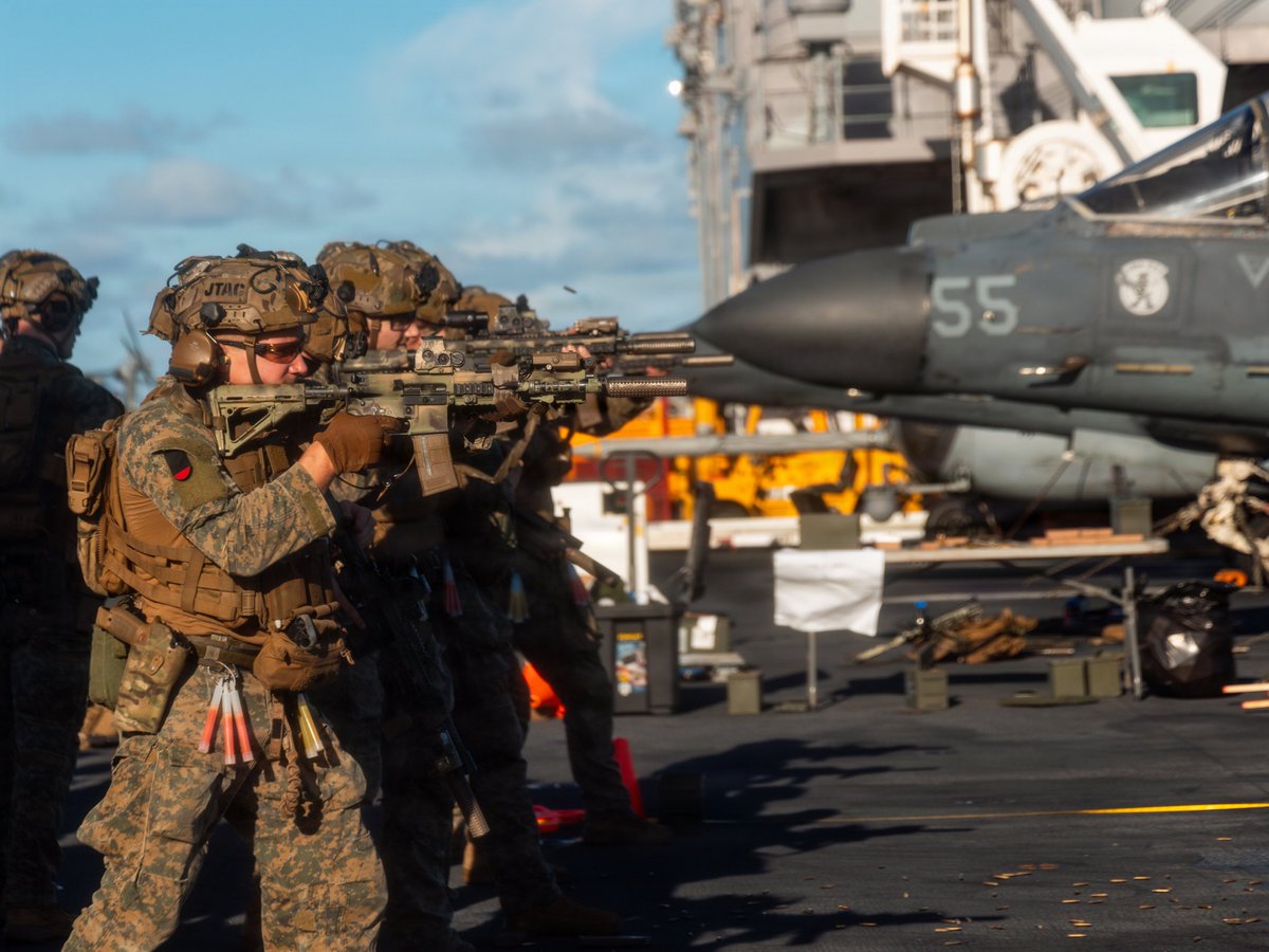 Southcom's tweet image. U.S. Marines with @22nd_MEU engage targets during a deck shoot aboard Wasp-class amphibious assault ship USS Iwo Jima (LHD 7) while underway in the Caribbean Sea, Nov. 22, 2025.

U.S. military forces are deployed to the Caribbean in support of #OpSouthernSpear.

@USMC | @SecWar |…