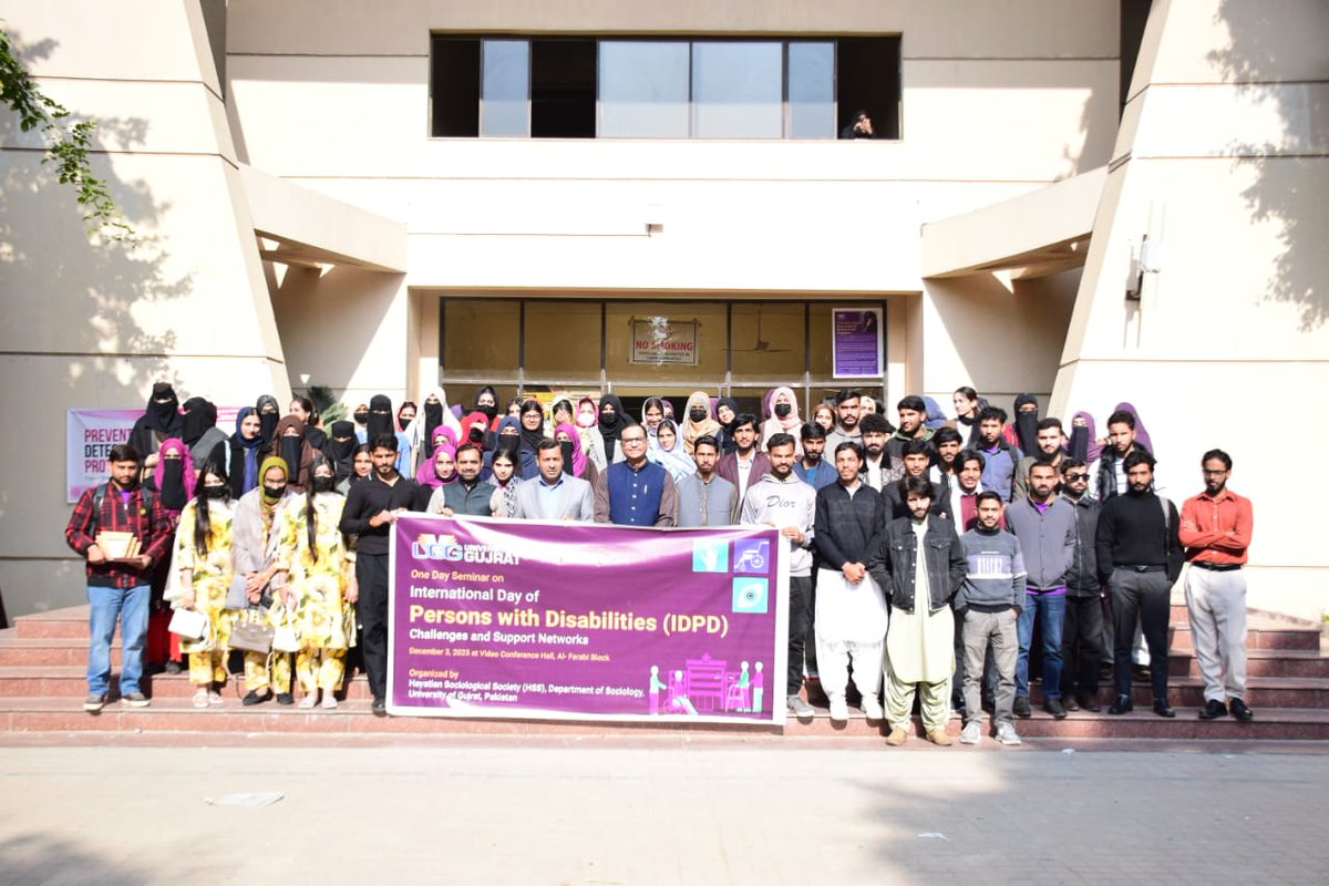Participants join together for a walk at Hafiz Hayat Campus to mark the International Day of Persons with Disabilities.