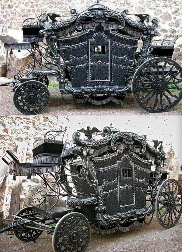 An amazing Victorian-era gothic horse drawn carriage.