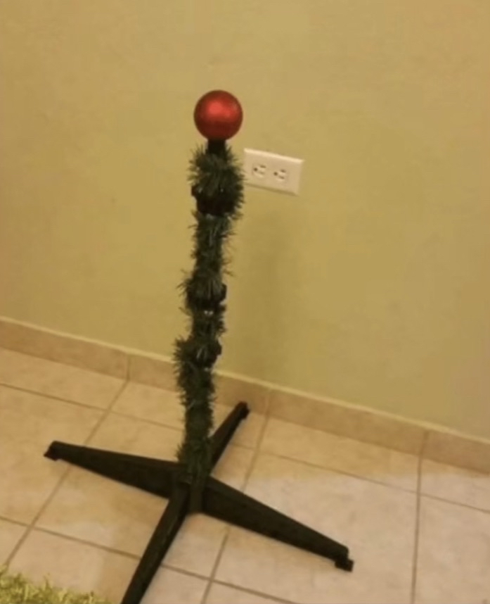 utenacentral's tweet photo. hi im at leon kennedy's house rn and this is his christmas tree https://t.co/1OrfrWfiHk