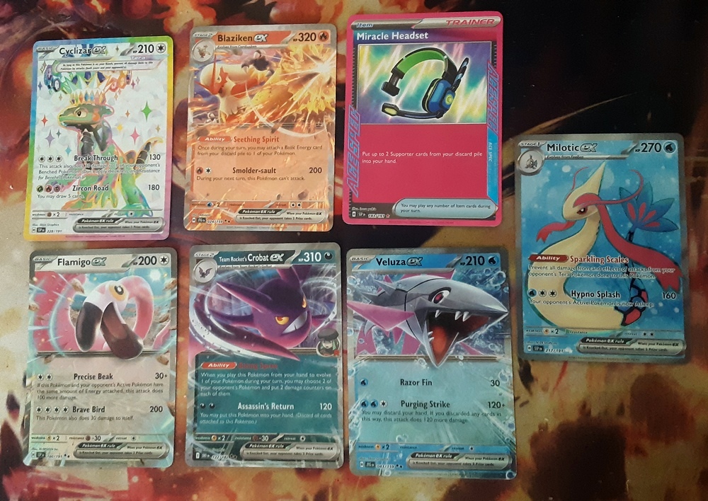 Pulls from 3 Walmart Black Friday tins. Glad I pulled an SIR from the first tin 😅