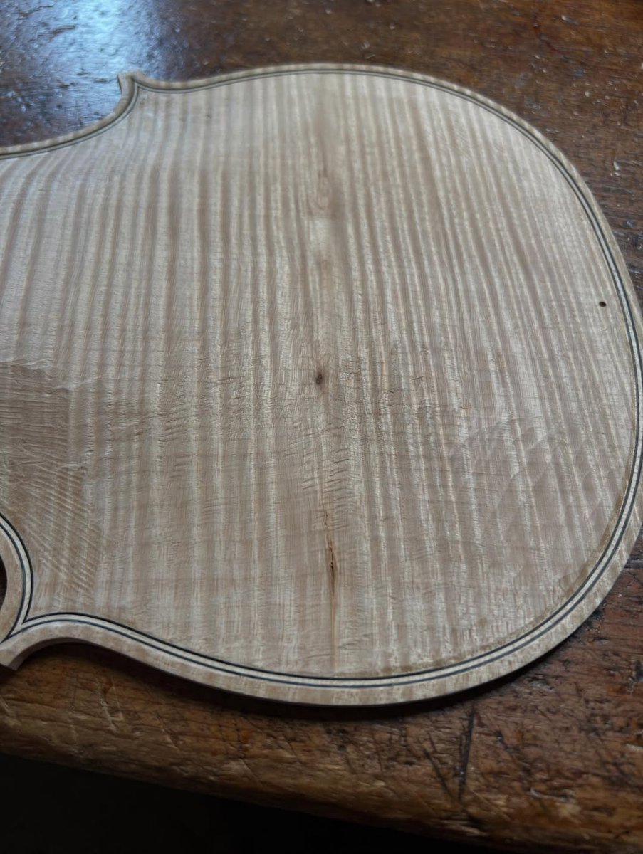 This is unfortunate. I chased this pin knot well past my typical arching shape. A small but open structure of this knot which went almost across the whole width of the back. I still had hope. This back is now a wall hanger. Off to find a new back. #luthier #violinmaker #violin