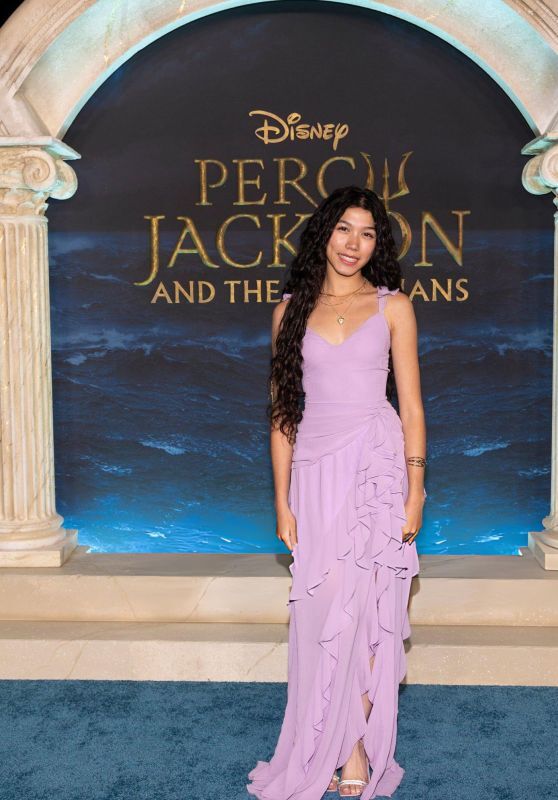 Txunamy Ortiz wore a ruffled lavender gown and silver heels at the Percy  Jackson Season 2 premiere. Txunamy Ortiz attended the world premiere of  Season 2 of Percy Jackson and the Olympians