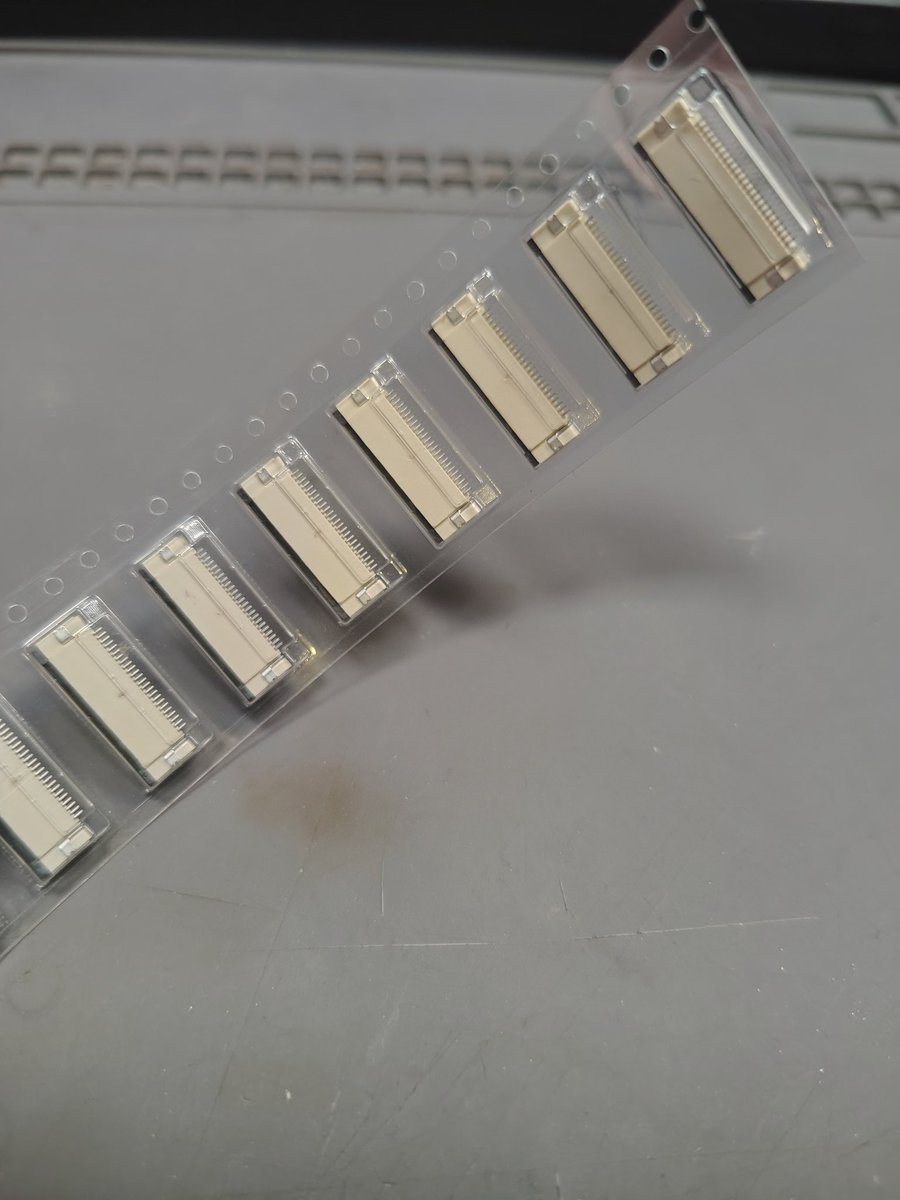 Midnighttech2's tweet image. Ribbon cable connectors are so darn cool looking when there still on the feeder tapes.