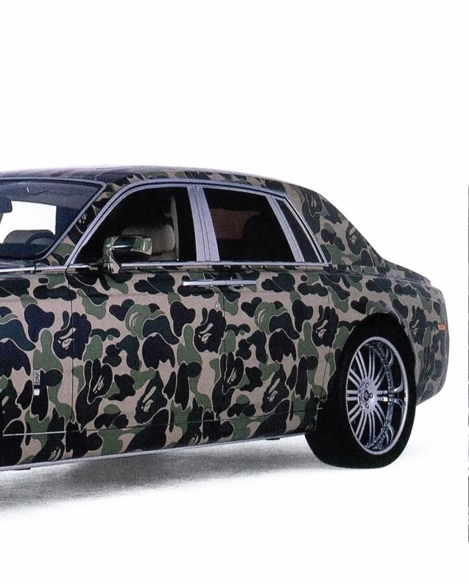 Nigo with his custom wrapped BAPE Rolls Royce (2006)