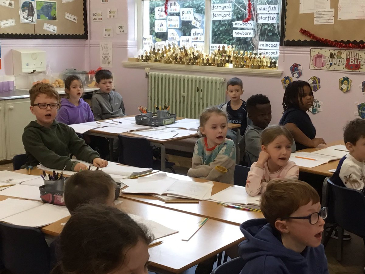 Class five participating in the Dan and Emily Advent live stream .