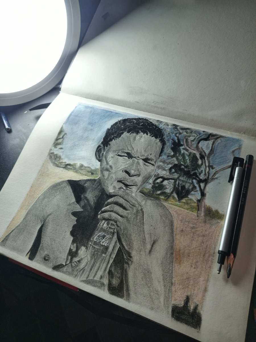PrimeOne_'s tweet image. My 2025 New Art piece Finished. A classic moment from “The Gods Must Be Crazy,” reimagined in charcoal and colour pencils 🔥👌🏾