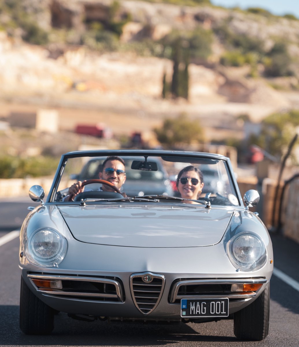 Nothing like a silver Alfa Romeo, sunshine, and a partner-in-style to make the road feel like your own private runway. Last year’s countryside smiles are calling you back - 27th September 2026, make sure you’re in on this.

📸 @rottamedia 
🌎 Malta