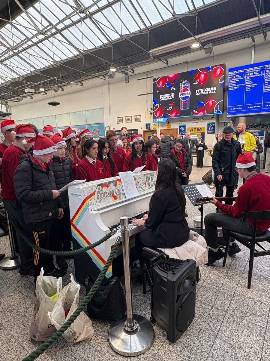 NanoNagleCol's tweet photo. A wonderful afternoon in Kent Station today for our school choir who performed in aid of Focus Ireland. The packed station really enjoyed the Christmas songs and atmosphere created. https://t.co/c0ktbG5nNf