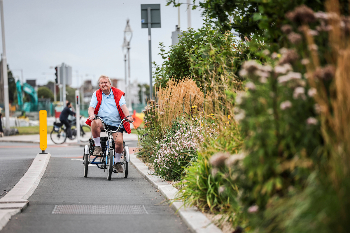 DubCityCouncil's tweet photo. One Year On! The Clontarf to City Centre Active Travel Scheme was officially opened in Fairview Park last year as part of the #ActiveTravelNetwork. Today, it’s delivering safer walking & cycling infrastructure, better public utilities, and green spaces for all. #C2CC https://t.co/kAXtlip9J0