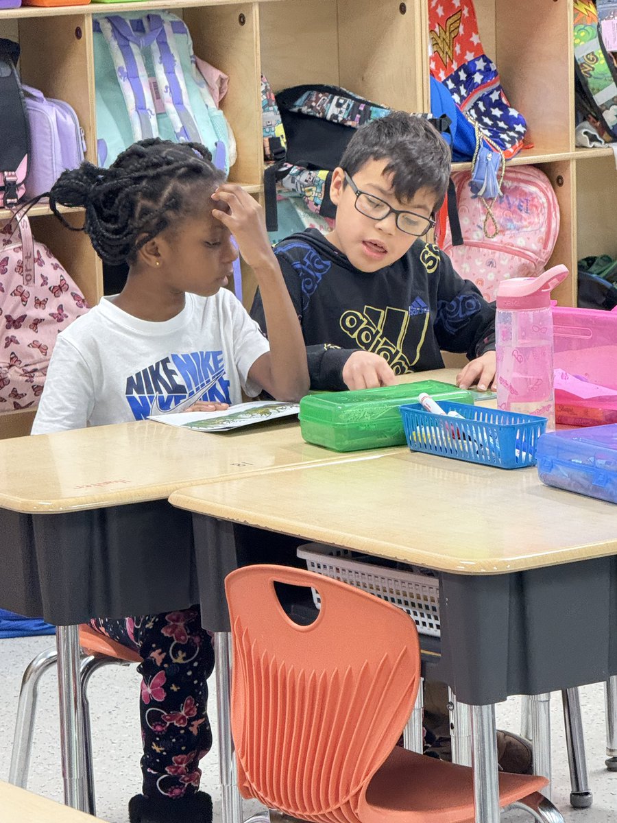 fcsdcentral's tweet image. Mrs. Staples’ 2nd grade students are partner reading a book called, “From Tadpole to Frog”.