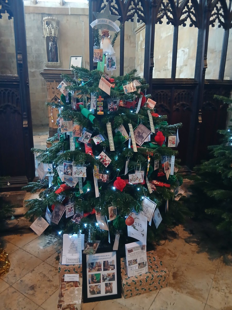 TheMobileMuseum's tweet photo. My Christmas tree is up at Beverley Minster East Yorks. The tree is retro/vintage. From crepe paper crackers &amp; paper baubles, to old Radio Times &amp; John Noakes lighting the Blue Peter advent crown &amp; more in between. If you can, pop along. 150 trees are on display til Sun 14th Dec https://t.co/wISniyp8gP