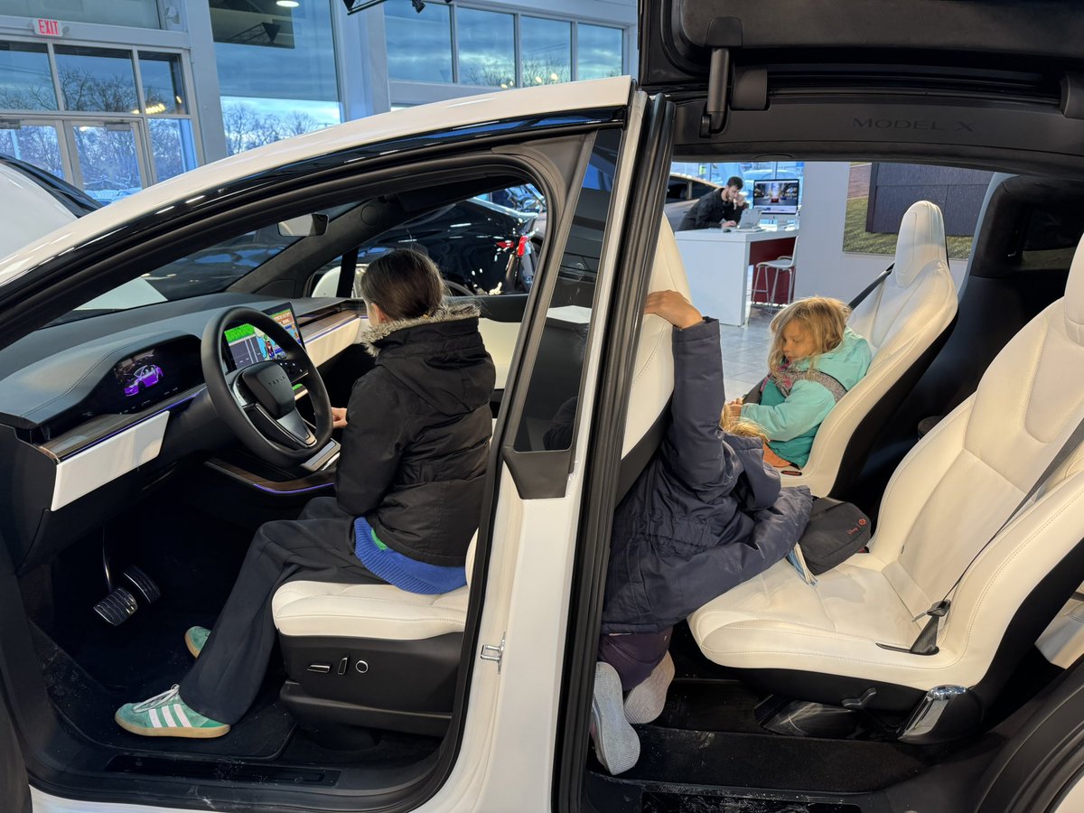 MSchwerha's tweet photo. The girls stopped by for a @Tesla holiday event to support @ToysForTots_USA and clean energy. https://t.co/YwOjsjVYB2