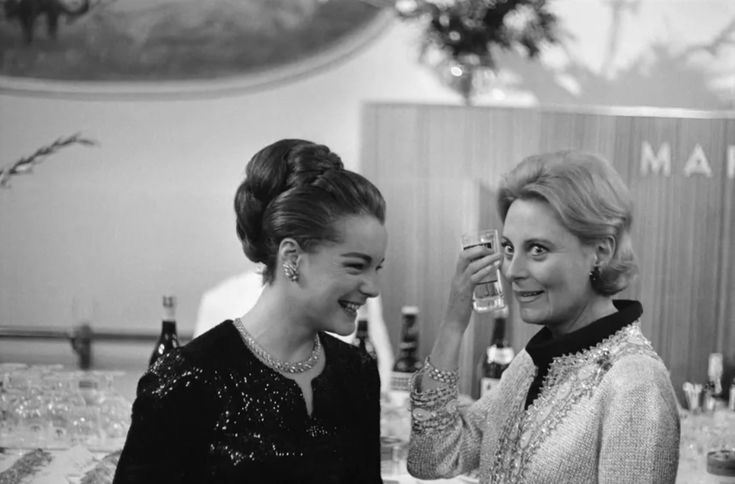 romy schneider and michèle morgan, 1965.