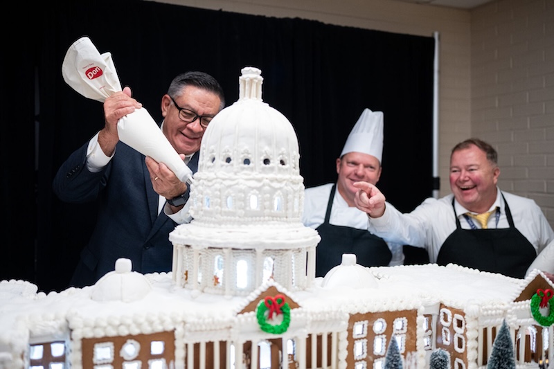 A suspect was arrested in a pipe bomb case related to Jan. 6. Adm. Frank M. Bradley briefed  members of Congress on strikes against alleged drug trafficking boats. A new member was sworn in on a pink Bible. And the Capitol gingerbread house got a sugar coating to kick off the