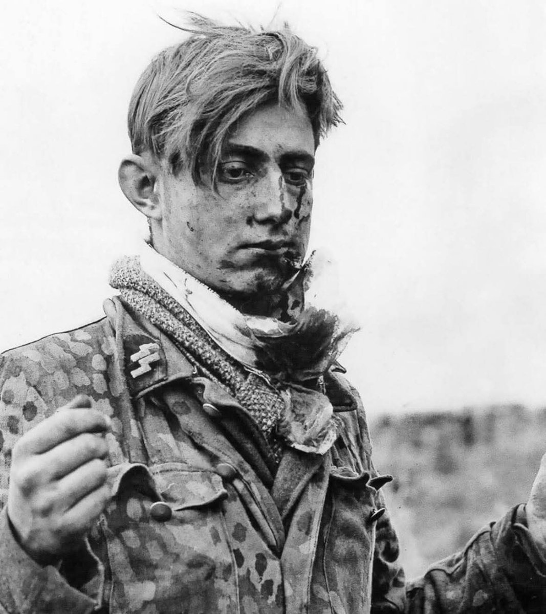 archeohistories's tweet image. A German Waffen-SS soldier that was captured by US soldiers during the Normandy campaign, 1944 .... 

His bloodied face and vacant expression reflect both the physical toll of battle and the collapse of Nazi Germany’s once-confident soldiers as the Allies advanced across Western…