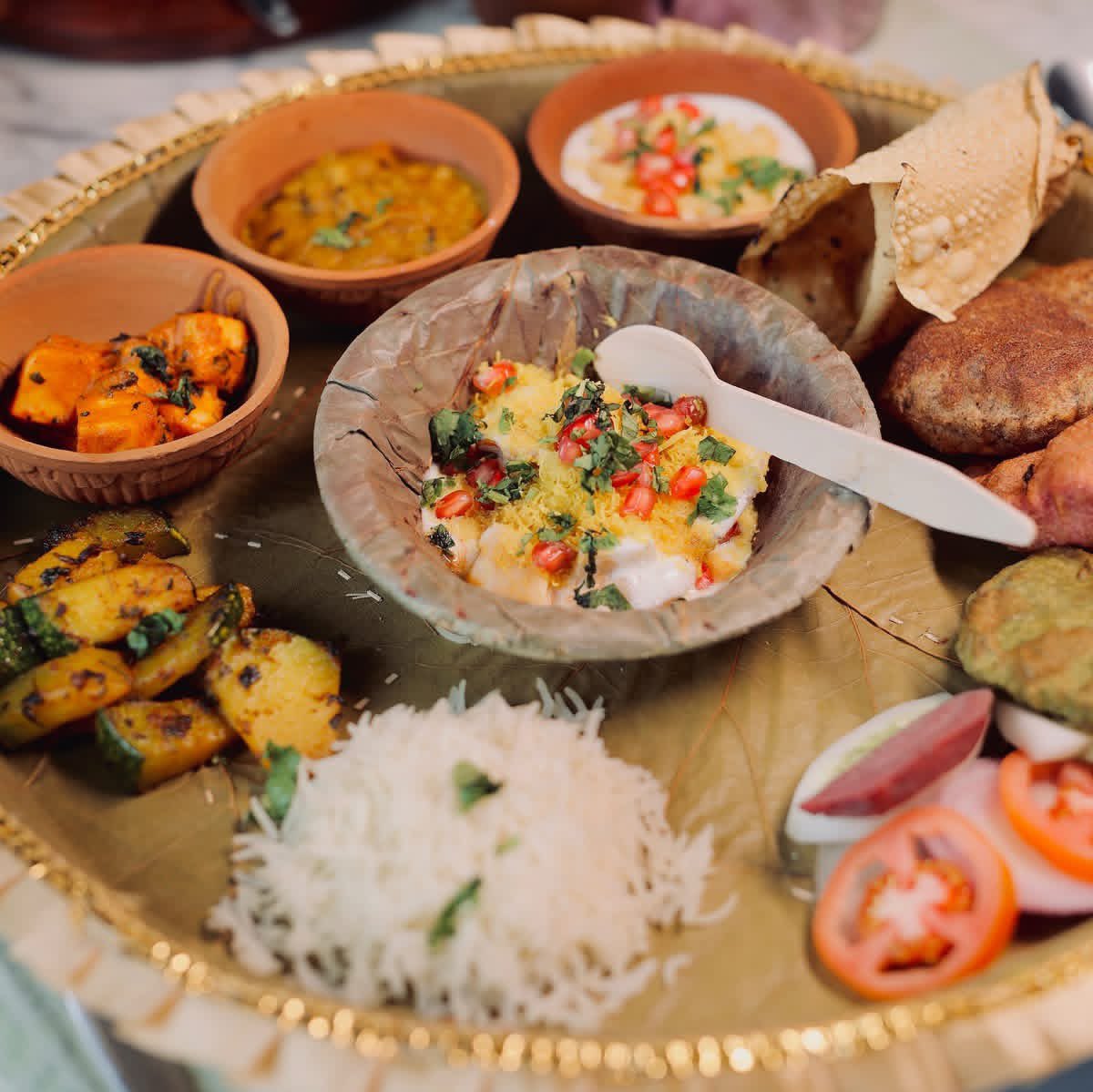 The story is a fact that a large part of India uses recyclable disposable cutlery and other time it uses reusable steel plates in particular in large numbers. 

Not only that except the ultra high consumption areas such as metro cities, people even use plastic bags multiple times