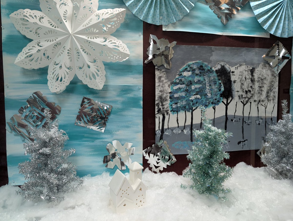 Setup some new displays at Garfield MS....It is starting to look a little more like winter around here! Now, onto prepping window painting for my students to paint throughout the school! The outside snow beat us to it this year! Smiles :)