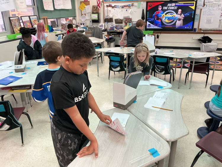 M19_MES's tweet image. Mrs. Helf's 2nd class at MES celebrated their opinion writing unit with a snack while reading everyone's final piece.  #19EveryStudent #MESProud
