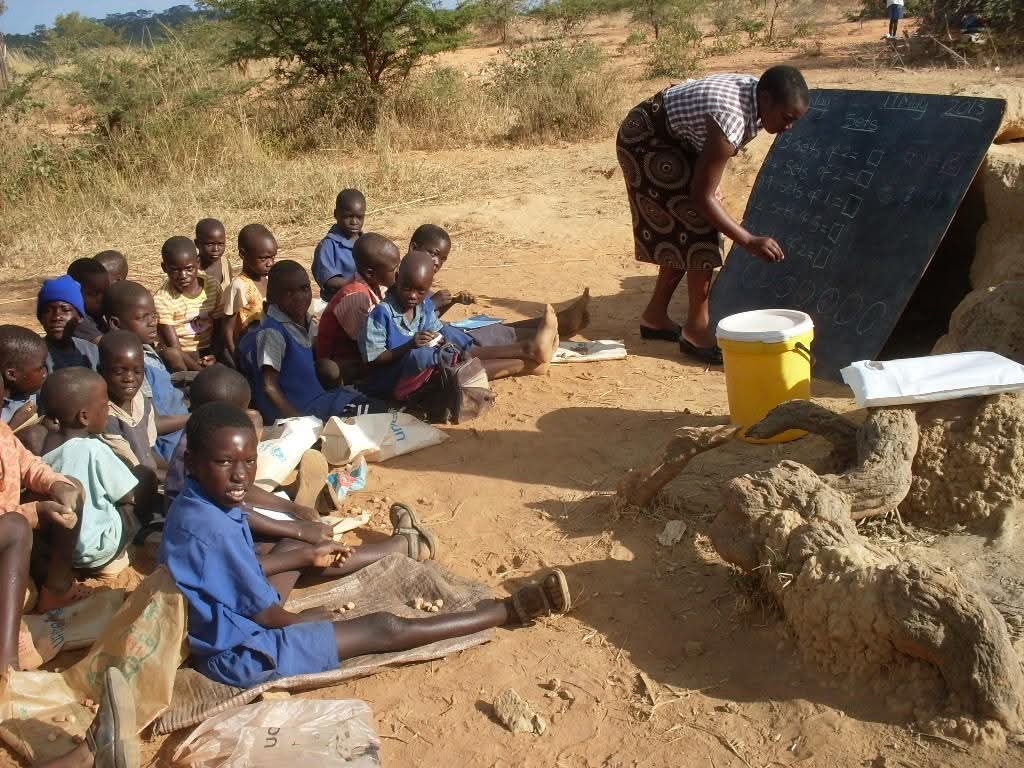 NgarivhumeJ's tweet image. We sleep on this one tonight. While ED is busy dishing out brand new SUVs to #twerking women supporters, the first picture is Kaguvi street (named after national first chimurenga icon Sekuru Gochetsvimbo Gumboreshumba Kaguvi) today after heavy downpour!