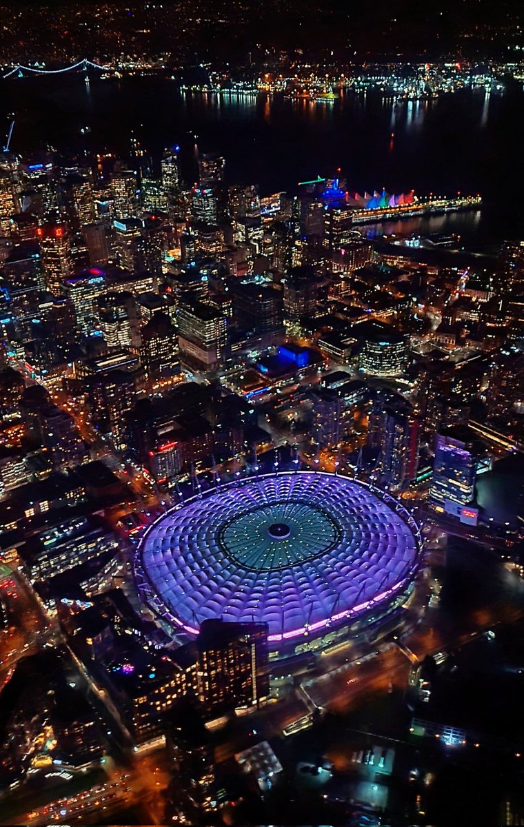 TrishJewison's tweet image. All lit up over downtown #Vancouver 💜