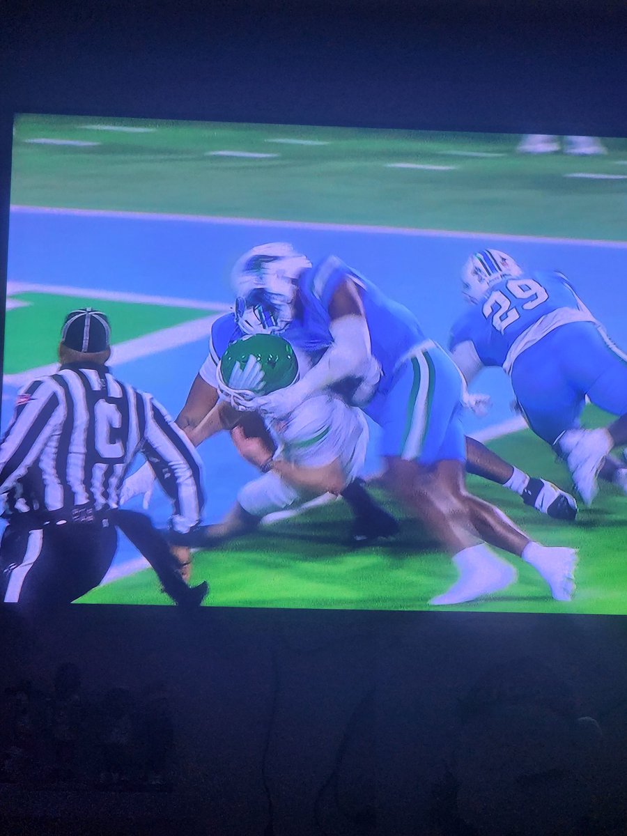 David7Houston's tweet photo. No evidence lol .. what a joke .. qb contact and ball loose .. common sense. . Should be a touchback .. north Texas vs Tulane  🤣🤣🤣 https://t.co/LJZF2KNvyY