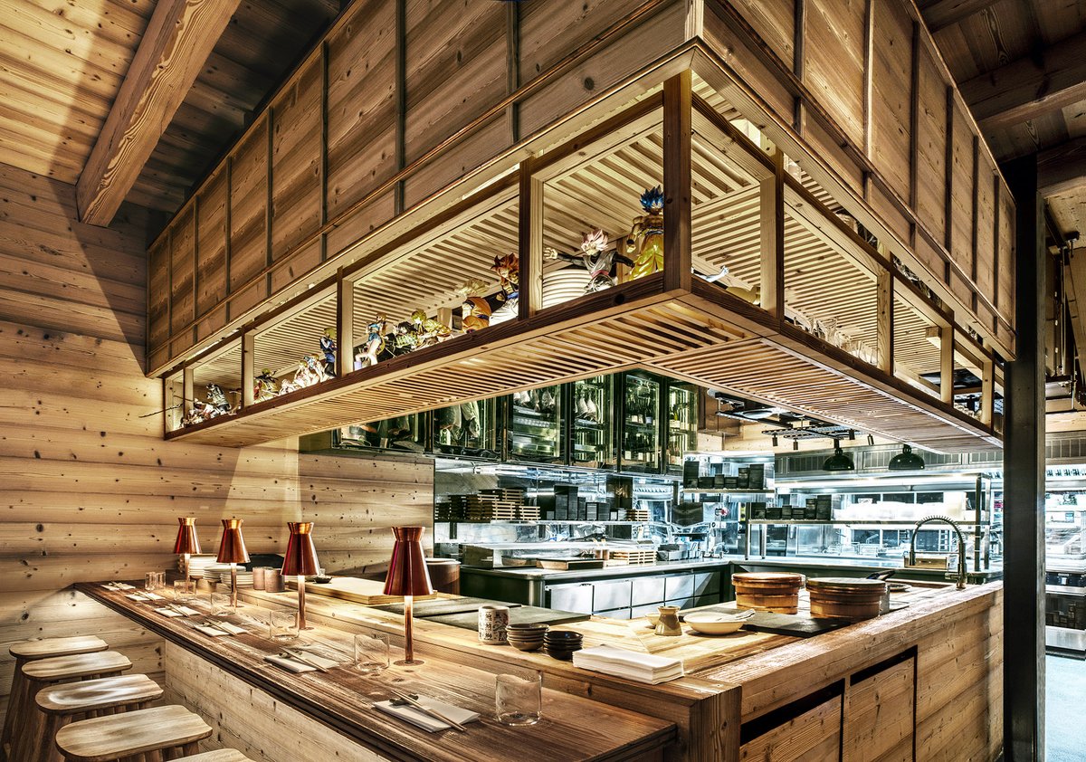 kellyhoppen's tweet photo. So excited to share our newest project with you. This intimate sushi bar in London is wrapped in sandblasted pine, raw copper and glazed tiles, with bespoke lighting that lifts every texture and detail. 
#sushi #japanese #bespoke https://t.co/EbUP0xABw5