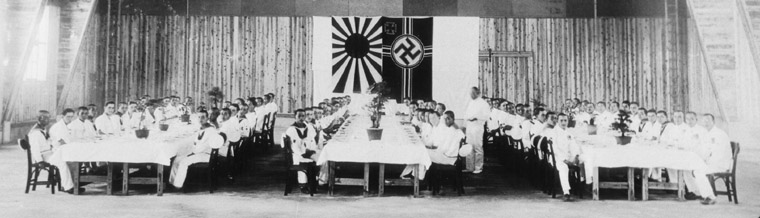 Japanese and German sailors at a reception for the crew of U-511