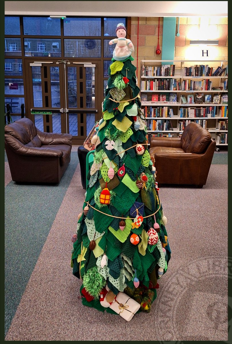 Behold! The famous Orkney Library &amp; Archive knitted #Christmas tree begins another season of festive cheer in the library! 🎄🧶❤️