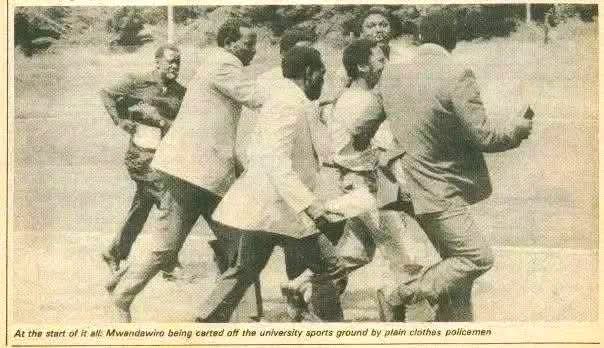 SokoAnalyst's tweet photo. In 1985 during a graduation ceremony at the University of Nairobi graduation square, something legendary transpired.

The Chancellor, President Daniel T Arap Moi was supposed to inspect a guard of honour mounted by the Kenya Army, Navy and Air Force.

As the commander waited for the President's arrival so that he could give the command ya kufunga mguu to his troops, the then SONU chairman, Mwandawiro Mgangha stepped forward majestically and did the unthinkable.

He took a daring move and inspected the parade himself, ahead of Moi. Hi attempt was short-lived though.

The hawk-eyed special branch cops whisked him into detention after he had matched about 20 steps.

The comrade was actually considered powerful then and daring. 

Credit: Presidential Archives
