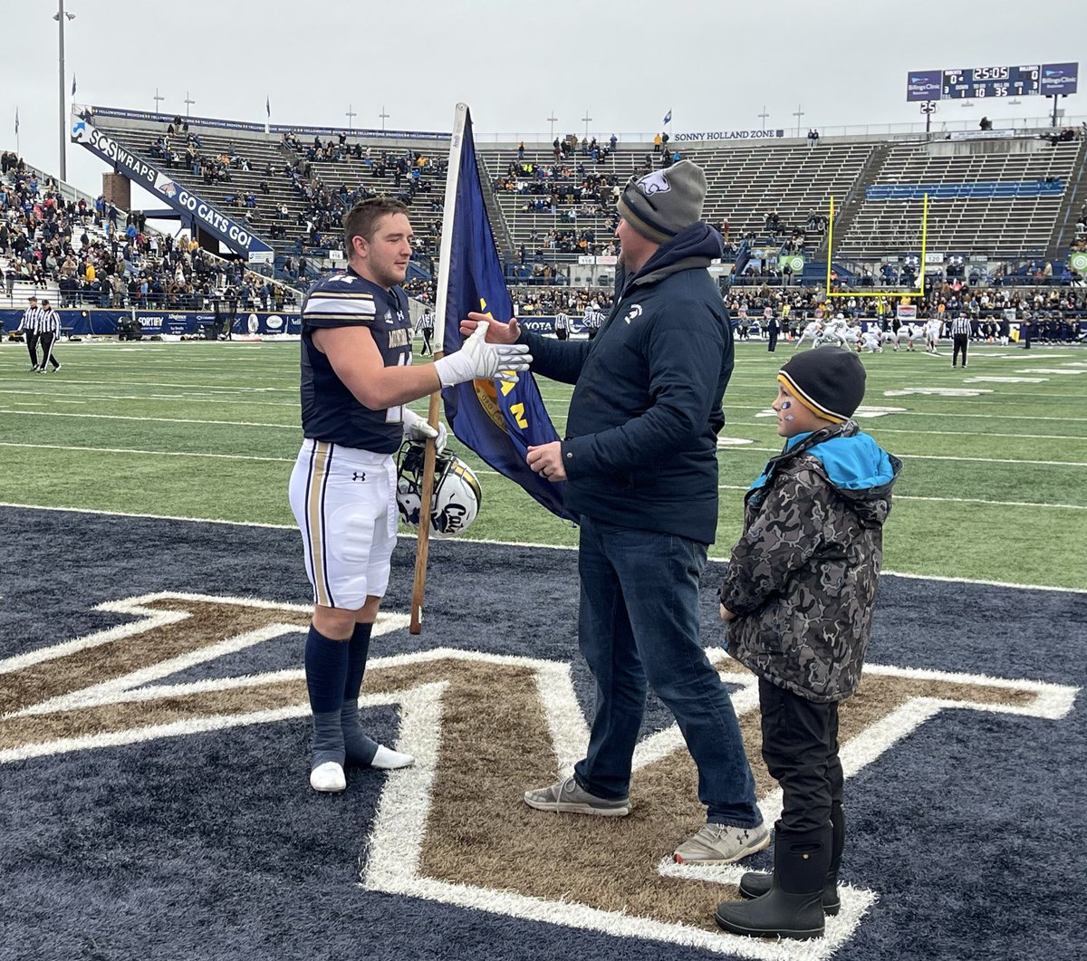 Today’s #MSUBobcatsFB Montana flag handoff: Brian Bignell to Kenneth Eiden IV.