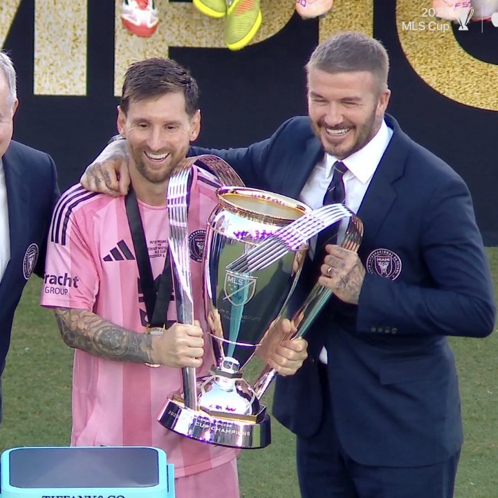 TouchlineX's tweet image. Thomas Müller looking at Leo Messi lifting the MLS trophy in front of him. 🫡✨