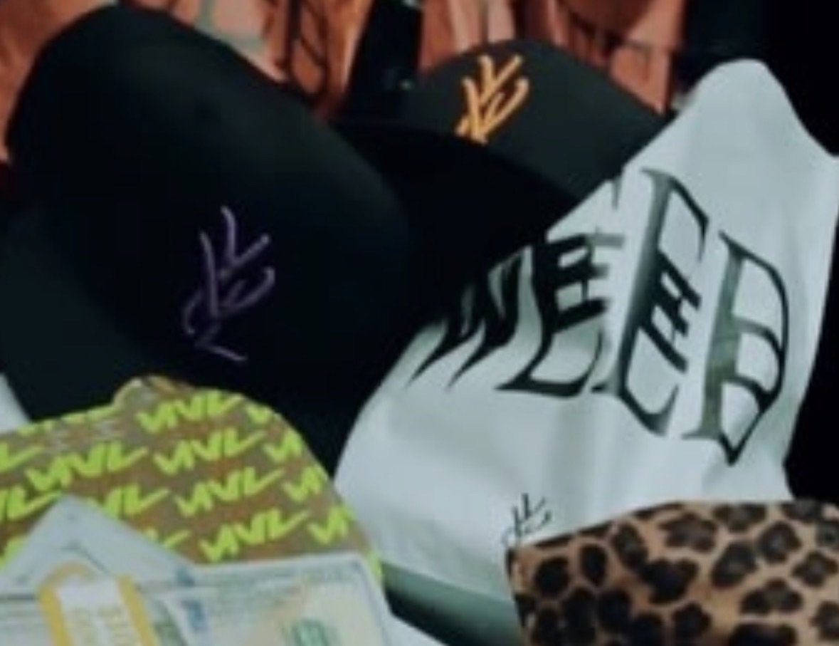 THARAGERS's tweet image. Playboi Carti starts his own C*nnabis brand called 'TRIMSET', fans recently spotted a teaser of it on 'Let's Do It' music video 🍃😭